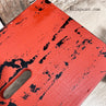 Red Wagon milk paint distressed over black with the Beeswax Bar