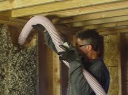 Installing Oregon Shepherd Sheep Wool Insulation into a Wall